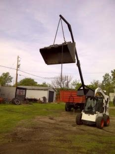 home made skid steer attachments|homemade skid steer boom pole.